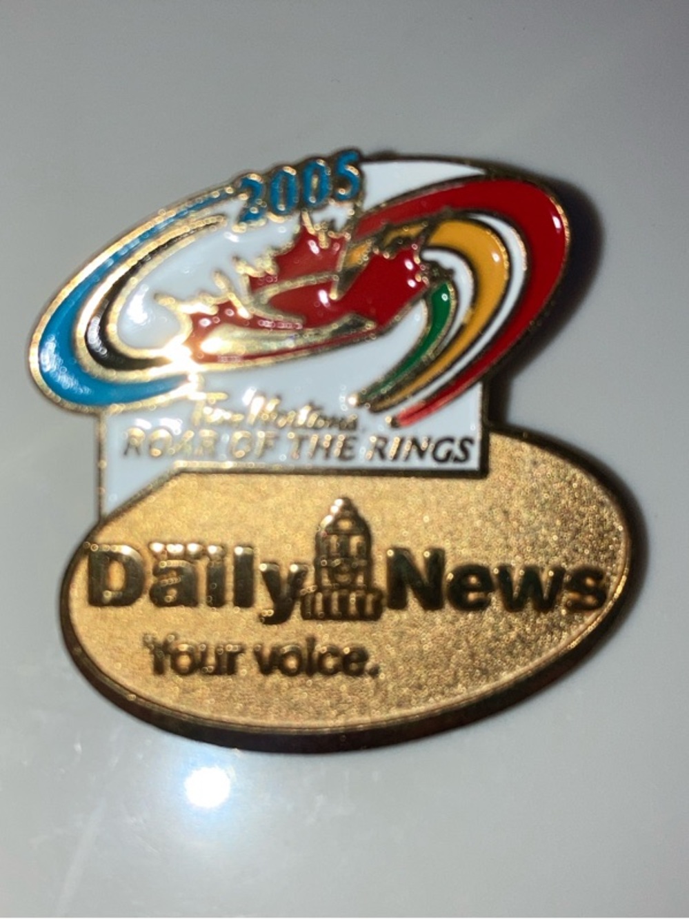 2005 Tim Hortons Roar of the Rings Dai News Gold and Multicolor Enamel Logo pin